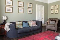 Grey sofa with patterned cushions