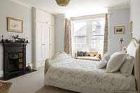 Classic bedroom with upholstered bed