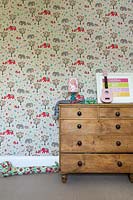 Patterned wallpaper in childs bedroom
