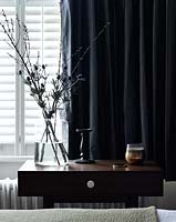 Modern accessories on wooden console table