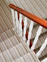 Striped carpet on staircase
