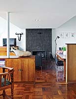 Open plan dining and living rooms with parquet floors