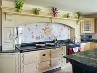 Aga with hand painted tiled splasback