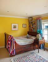 Childs bedroom with antique french bed