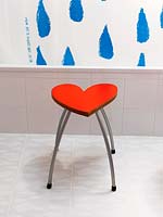 Heart shaped stool in bathroom