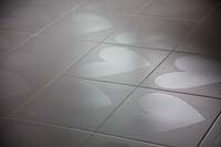 White tiles with heart motif