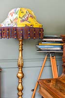 Patterned standard lamp with tassel trim