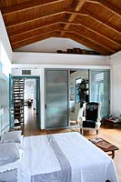 Bedroom with wooden ceiling