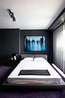 Modern art above bed