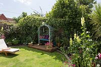 Back garden with arbour seat