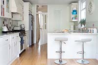 Modern kitchen with barstools