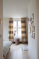Striped curtains in bedroom