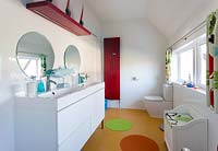 Modern bathroom with colourful toys and ornaments