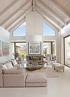 Modern living room with vaulted ceiling