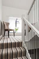 Striped carpet on stairs