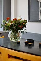 Colourful flowers on dining table