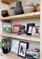 Accessories on wooden bookcase