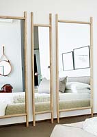 Large mirrors in bedroom