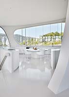 White kitchen with curved walls
