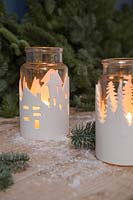 Clay Lanterns - glass jars wrapped with a textured clay cityscape 