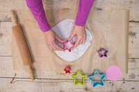 Making clay stars - Use the star shape cutters to create a variety of different sized stars