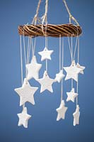 Homemade clay stars with a floral design