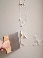 Removing paint from bathroom wall