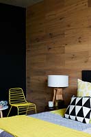 Wooden feature wall in bedroom