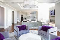 Square armchairs with purple cushions