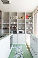 Contemporary kitchen with tiled floor