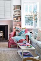 Blue throw on pink armchair
