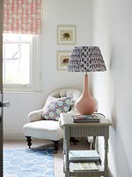 Patterned lamp on side table