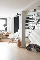 Eames chair by staircase