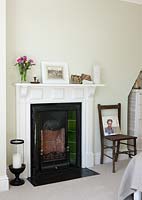 Period fireplace in bedroom