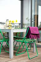 Colourful furniture on roof terrace