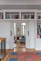 Bookshelves above doorway