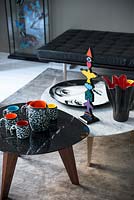 Colourful accessories on coffee tables