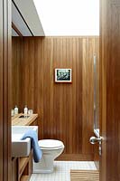 Timber clad wall in bathroom