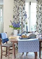 Patterned crockery on dining table