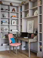 Desk surrounded by shelving