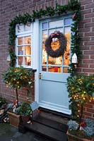 Christmas decorations around front door