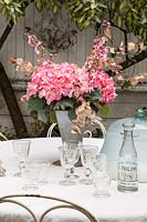 Flower arrangement on garden table
