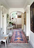 Patterned rug in hall