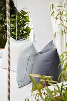 Grey cushions on daybed