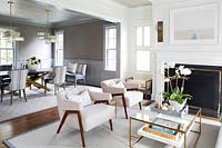 White armchairs in seating area