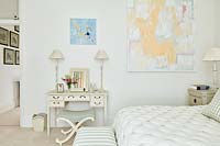 Abstract paintings in bedroom