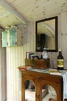 Vintage cabinet in converted shepherds hut