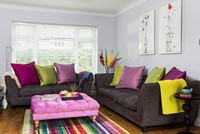Colourful cushions on sofas
