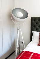 Industrial style lamp by bed