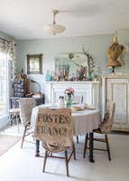 Dining room with vintage furniture and collectibles